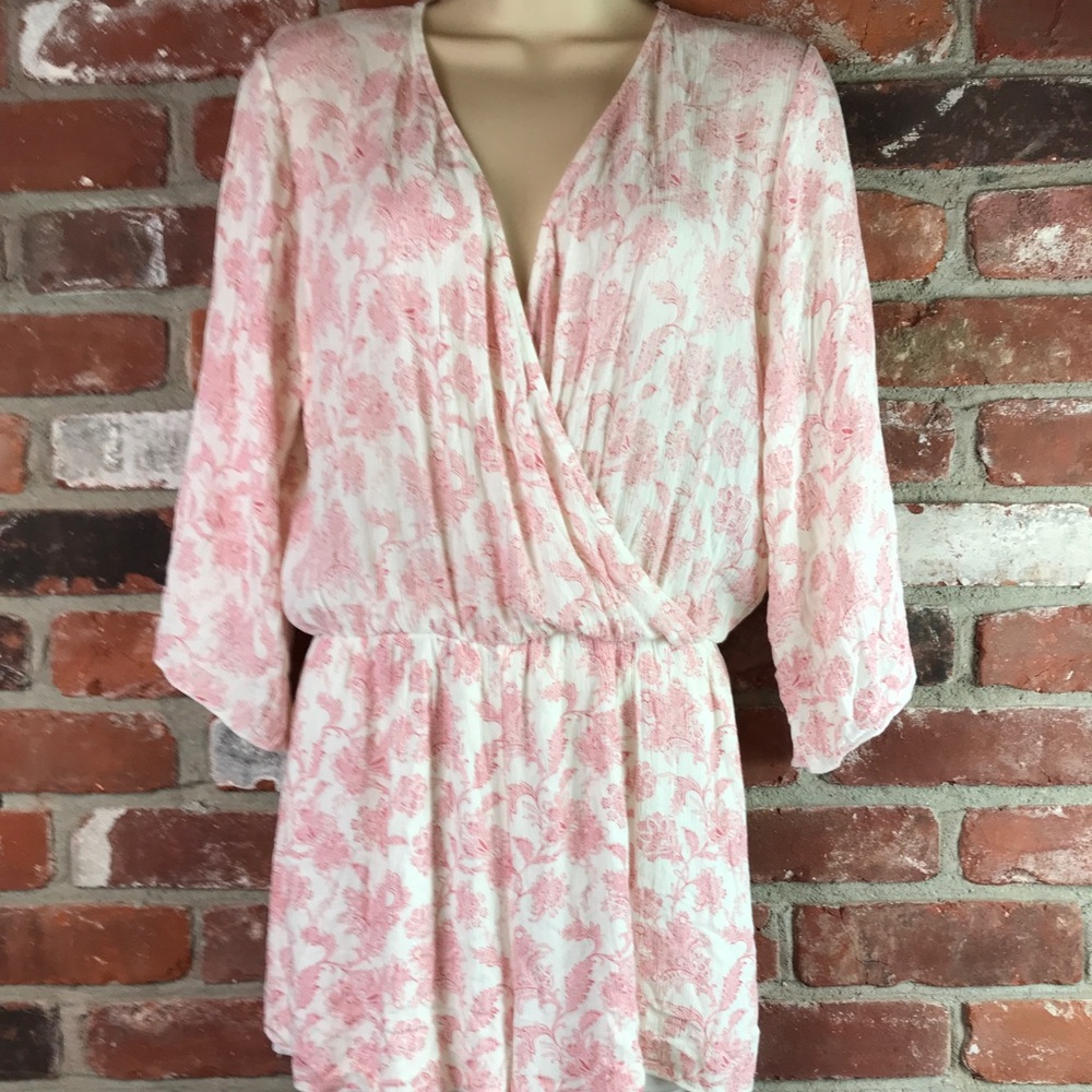 Robin-K romper size Medium will fit a size 4-6